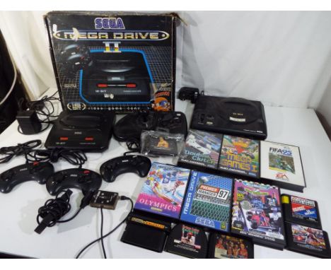 Sega - a lot to include Sega Megadrive system Arcade power stick and a boxed Sega Megadrive 2 system with two controllers and