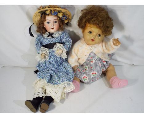 Vintage dolls - a bisque doll in period dress with jointed limbs, sleeping eyes, open mouth with four ceramic top teeth, appr