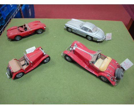 Four Diecast Model Sports Cars, by Frankin Mint, The Danbury Mint, including 1948 MG TC, 1954 Mercedes-Benz 300SL, 1958 Ferra