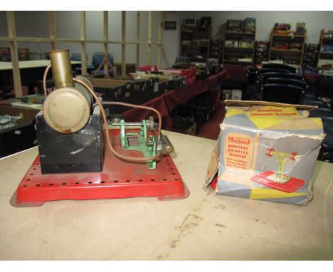 A Mamod Stationary Steam Engine, (playworn/parts missing), plus a Mamod Grinding Wheel, boxed. 