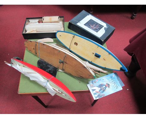 A Bowman Pond Yacht and Two Star Pond Yachts, including 'Arctic Star' and an unmade model of H.M.S. Victory by Marinecraft. 