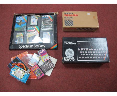 A Boxed Sinclair ZX Spectrum 48K RAM Personal Computer, Sharp RD-630E portable cassette tape recorder (boxed), official Sincl