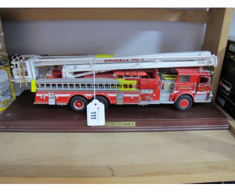 A Franklin Mint 1:32nd Scale Diecast Pierce Snorkel Fire Engine, previously displayed, plinth present, unchecked.