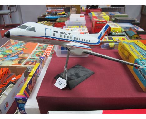 A Resin Model of a Saab Fairchild 340 Aircraft, by Space Models, with stand, 40cm long.