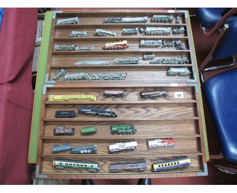 Forty Three White Metal N Gauge and Similar Static Display Locomotives, Tenders, Coaches, including two wooden (five shelf) d