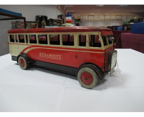 A Mid XX Century Tinplate Single Decker Bus by Chad Valley, clockwork, finished  in 'red/white' with rare 'Red and White' leg