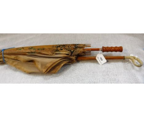 A VINTAGE PARASOL and a Japanese paper parasol