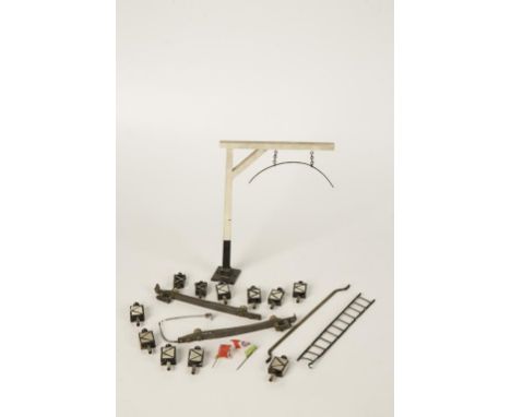 A GAUGE 1 BASSETT-LOWKE "RAILROAD HEIGHT GAUGE", a collection of signal lamps and a ladder, circa 1920s and earlier