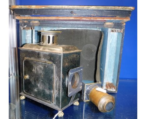 A LATE 19TH/EARLY 20TH CENTURY TOY MAGIC LANTERN with the remains of the original box