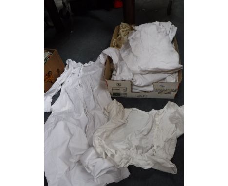 A COLLECTION OF VINTAGE LINENS including table cloths, night shirts and other items