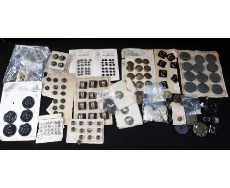 A COLLECTION OF VINTAGE BUTTONS, some attached to original cards