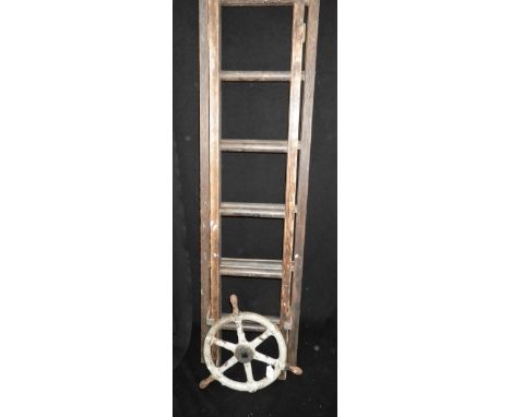 RAILWAY INTEREST; A VINTAGE B.R. CAST IRON "GUARD'S VAN BRAKE WHEEL", 12.25" dia. (wheel) painted grey and a B.R. Guard's van