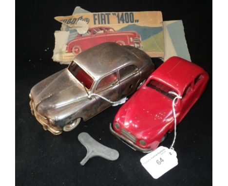 CHAD VALLEY; A RED CLOCKWORK TINPLATE SALOON CAR and an Italian "Ingap" tinplate car (2) circa 1950s