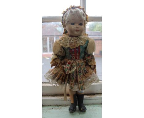 A VINTAGE COLLECTABLE DOLL in traditional Czechoslovakian dress 