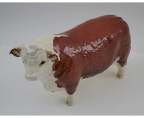 A BESWICK CERAMIC HEREFORD BULL "Champion of Champions", 12cm high 