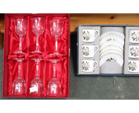 A BOXED ROYAL WORCESTER COFFEE SERVICE, together with a box containing six stemmed wine glasses 