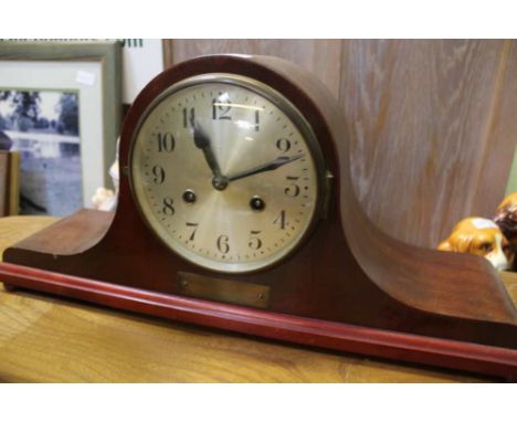 A MAHOGANY FINISHED NAPOLEON'S HAT STYLE MANTEL CLOCK 