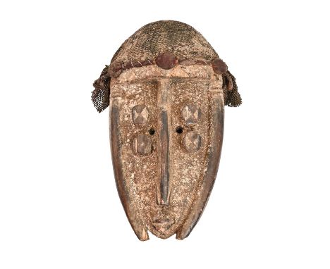 Tribal art. Central Africa - a carved wood mask, possibly Leja DRC, mid 20th c, 34cm  Numerous chips and scuffs, signs of old