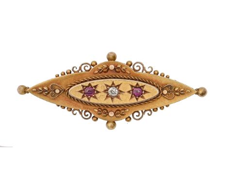 A Victorian shuttle shaped ruby and diamond brooch, in 15ct gold, 47mm l, Birmingham 1897, 4.9g  Good condition