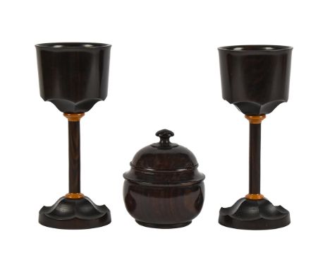 A pair of turned macassar ebony goblets, 17cm h, steel insert in base stamped R. KELL 1981 and a contemporary turned wood pot