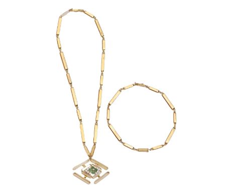 An emerald and diamond pendant, in 18ct gold, on integral necklet and two further sections of matching 18ct gold chain to for