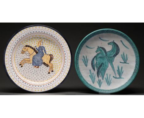 A Continental tin glazed earthenware charger and a Swiss earthenware dish, c1960s / 70s, painted with a lady on horseback or 