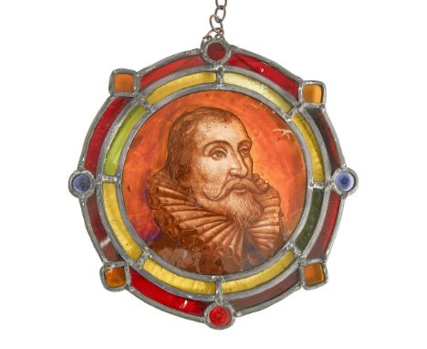 Architectural Salvage. A stained glass roundel, late 19th/early 20th c, with a portrait of a Renaissance statesman, radiating