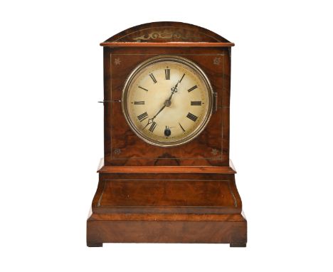 A brass inlaid walnut mantel clock, early 20th c, with painted dial, pendulum, 37cm h; 27 x 16cm  Dial scratched and stained,