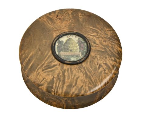 A turned and stained 'mulberry' (field maple) snuff box, early 19th c, the cover inset with a hand coloured miniature engravi