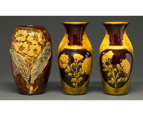 A Longpark art pottery vase, early 20th c, applied with flowers and leaves, 19cm h, incised LONGPARK TORQUAY and a pair of si