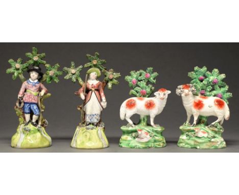 A pair of Walton earthenware figures of gleaners and a pair of Salt models of a ram and ewe, both c1830, with overglaze ename