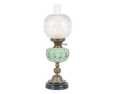 A Victorian brass oil lamp, on ebonised base, enamelled glass fount and etched shade, 56cm h  
