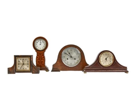 An Edwardian Art Nouveau inlaid mahogany balloon clock, with trench movement and enamel dial, 29cm h and three various other 