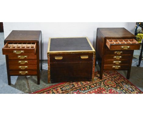 A brass bound mahogany trunk, 52cm h; 65 x 50cm and a pair of mahogany filing cabinets, 71cm h, the drawers later fitted with