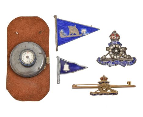 A gold and enamel Royal Artillery sweetheart's brooch, another of paste set silver and enamel, an Egyptian silver and enamel 