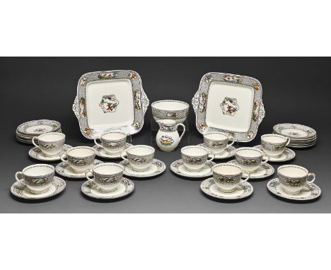 A Wedgwood bone china tea service, early 20th c, with black seaweed border, the service including a pair of square plates, 26