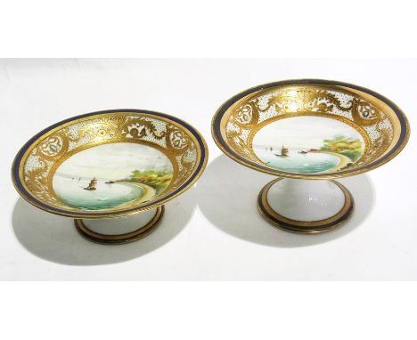 Noritake porcelain dessert service, gilt and cobalt blue rim, raised enamel frieze decoration and central handpainted scene o