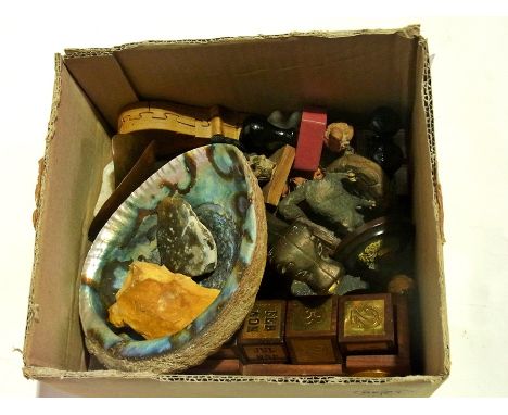 A collection of letter stamps, some Disc World clay craft animal figures, ashtray, a dog nutcracker, a clock and a stained gl