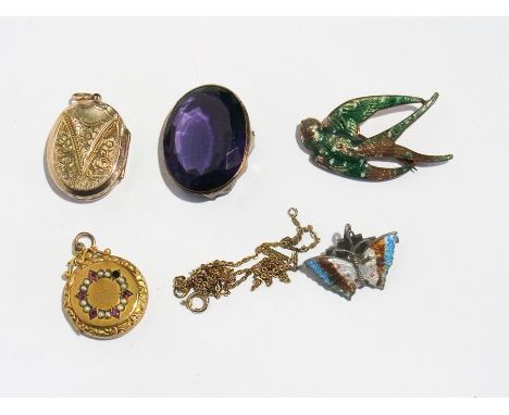 Enamel butterfly brooch, enamel bird brooch, two lockets and an amethyst-coloured stone in mount 