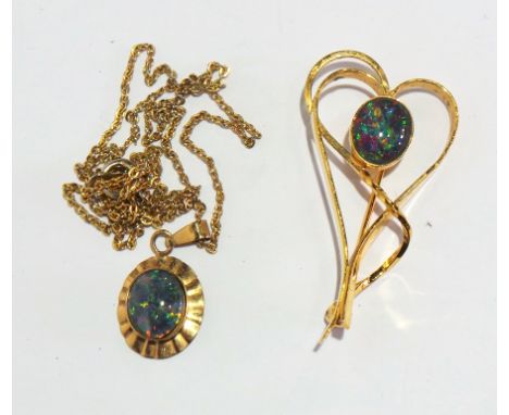 9 ct gold opal ring, 9ct gold pendant on chain and a silver gilt set opal brooch