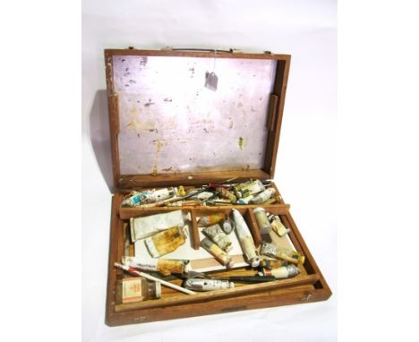 A wooden box with artist's oils, artist's tools, paintbrush and canvas and a mahogany box 