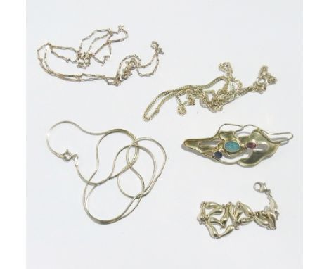 Quantity of various silver chain necklaces, silver gilt fine necklace and a brooch of pierced and raised stylised decoration 