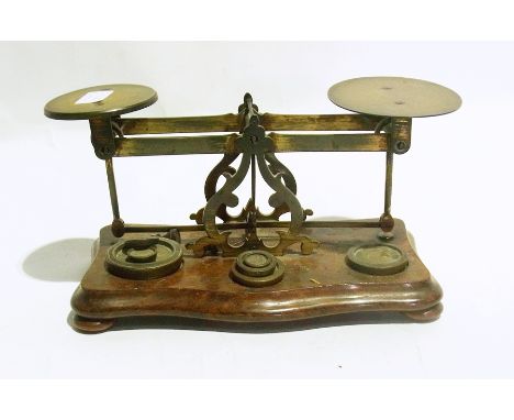 Pair of postage scales with weights, a brass and japanned metal postage scale and a W Winterfield Birmingham brass spring sca