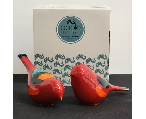 PAIR OF POOLE POTTERY VOLCANO BIRDSwith vibrant red bodies with orange hues, boxed and 15cm long (2) 