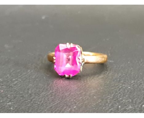 RUBY SINGLE STONE RINGon eighteen carat gold shank, the ruby measuring approximately 9mm x 7.7mm x 4.1mm, ring size K and app