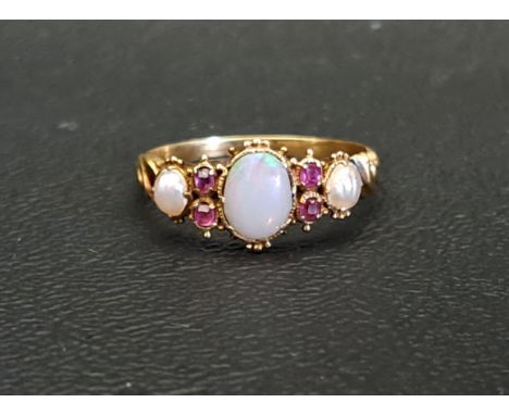 VICTORIAN OPAL, RUBY AND SEED PEARL RINGthe central opal measuring 6mm x 5mm, in unmarked high carat gold (tests as 18 carat)