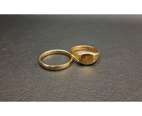 TWO GOLD RINGSone a fourteen carat gold band, ring size X and 1.9 grams; and the other a nine carat gold signet ring, size S 