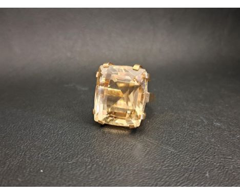 VERY LARGE CITRINE DRESS RINGthe citrine measuring approximately 22.7mm x 19.6mm x 15.5mm, on nine carat gold shank, ring siz