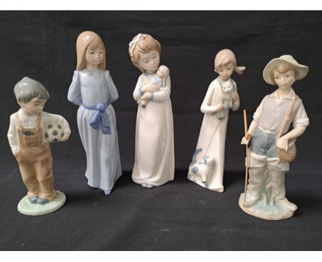 FIVE PORCELAIN SPANISH FIGURINEScomprising a Lladro Gone Fishing 4809, 22cm high, Nao boy with football, 18.5cm high, Nao gir