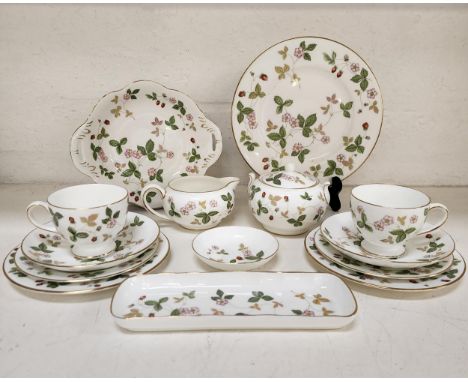 WEDGWOOD WILD STRAWBERRY TEA SETcomprising twelve cups and saucers, twelve side plates of two sizes, sandwich plate, three va